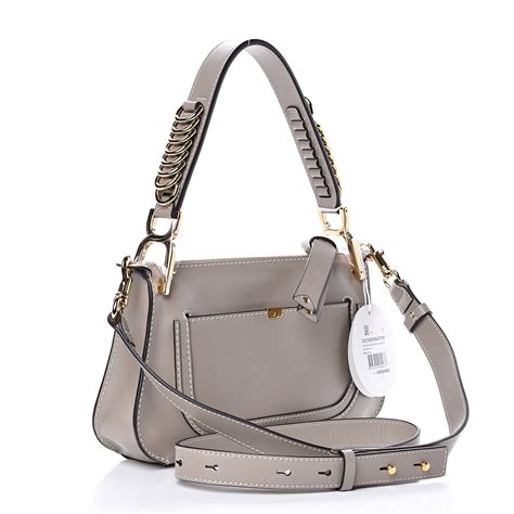 Mini Marcie Round Saddle Bag In Motty Grey Smooth Calfskin